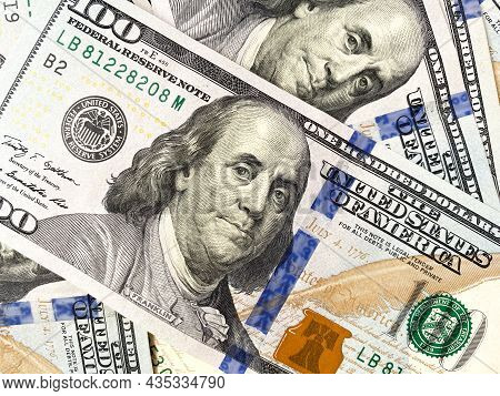 Background Of Hundred-dollar Bills. The Texture Of Hundred-dollar Bills. A Lot Of Dollars