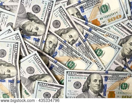 Background Of Hundred-dollar Bills. The Texture Of Hundred-dollar Bills. A Lot Of Dollars