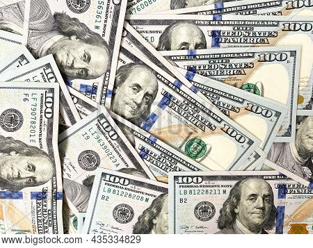 Background Of Hundred-dollar Bills. The Texture Of Hundred-dollar Bills. A Lot Of Dollars