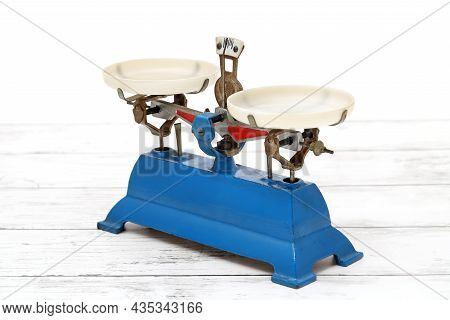 Retro Roberval Balance, Scale On The White Wooden Table