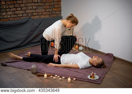 Relax And Enjoy In Spa Salon Getting Thai Massage By Professional Masseur Woman Lying Floor Blanket 