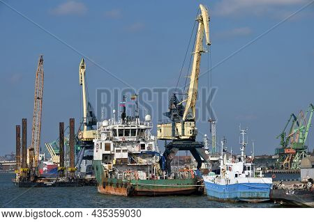 Klaipeda, Lithuania - October 02: Boats And Cranes At Klaipeda Sea Port At October 02, 2021 In Klaip
