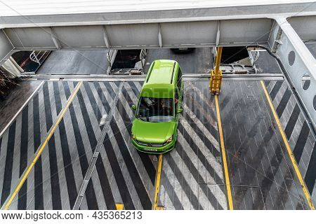 Los Cristianos, Spain - August 9, 2021: Vehicles Boarding The Ferry In Los Cristianos Harbour. Roro 