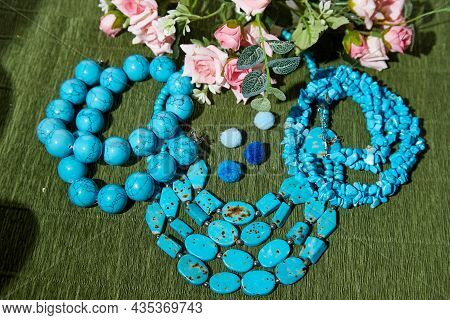 Beautiful Blue Beads. The Concept Of A Beautiful, Elegant Life And Beautiful Decoration For Woman