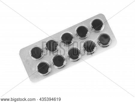 Activated Charcoal Pills In Blister Isolated On White, Top View. Potent Sorbent