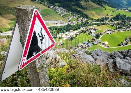 Fall Danger Warning Sign Near A High Cliff
