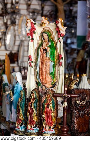 Buga, Colombia - October 2021. Sale Of Religious Articles Close To The Minor Basilica Of The Lord Of