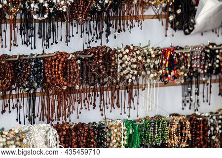Buga, Colombia - October 2021. Sale Of Religious Articles Close To The Minor Basilica Of The Lord Of