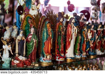 Buga, Colombia - October 2021. Sale Of Religious Articles Close To The Minor Basilica Of The Lord Of