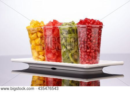 Watermelon , Pineapple  , Pomegrenate And Kiwi
