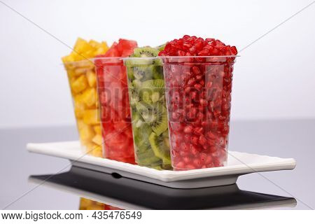 Watermelon , Pineapple  , Pomegrenate And Kiwi