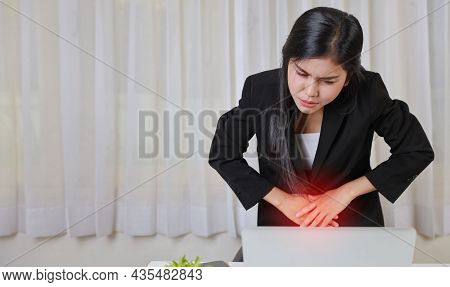Young Asian Stressed Businesswoman Feeling Pain Or Having Problem With Part Of Body Menstrual Pain O
