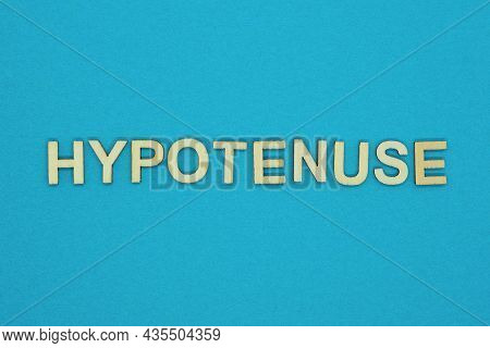 Gray Word Hypotenuse In Small Wooden Letters On A Blue Background