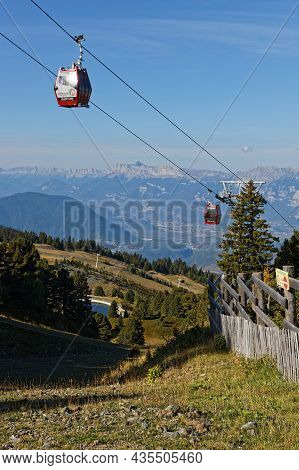 Chamrousse, France, September 13, 2021 : Red Cabins Of The Cable-car Of Chamrousse Mountain Resort O