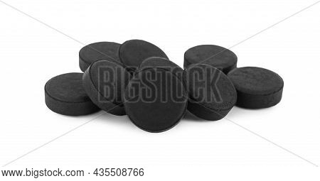 Activated Charcoal Pills On White Background. Potent Sorbent