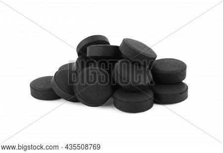 Activated Charcoal Pills On White Background. Potent Sorbent