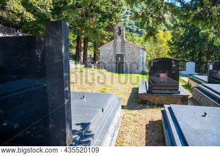 Podostrog, Budva - September 23, 2021: Church Of St. John The Theologian And Cemetery Near, Podostro