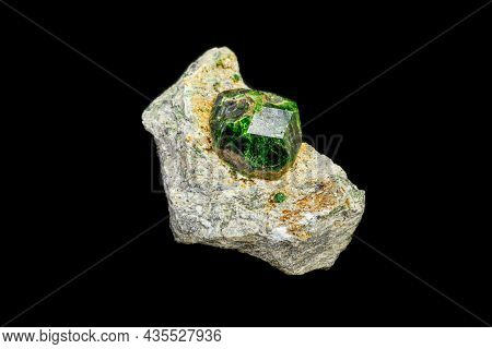 Macro Mineral Stone Andradite On A Black Background Close-up