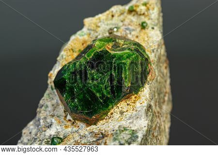 Macro Mineral Stone Andradite On A Black Background Close-up