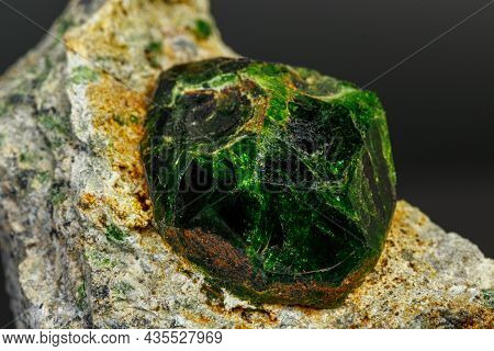 Macro Mineral Stone Andradite On A Black Background Close-up