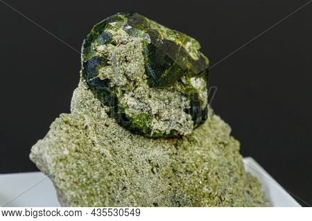 Macro Mineral Stone Andradite On A Black Background Close-up