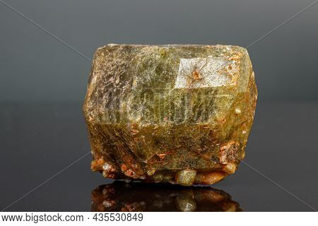 Macro Mineral Stone Andradite On A Black Background Close-up