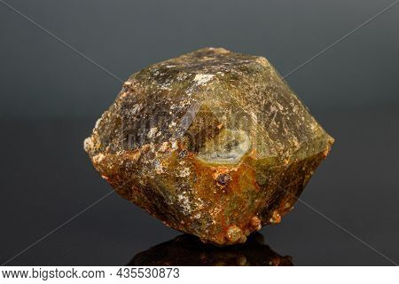 Macro Mineral Stone Andradite On A Black Background Close-up