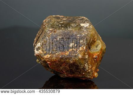 Macro Mineral Stone Andradite On A Black Background Close-up