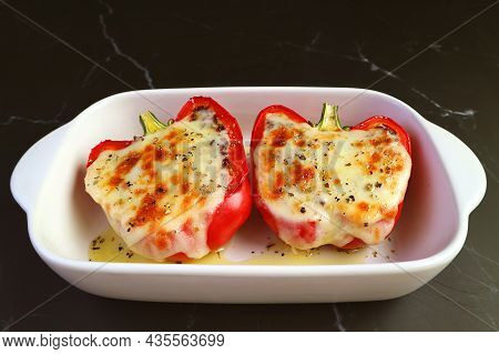 Pair Of Fresh Cooked Mouthwatering Homemade Stuffed Bell Peppers With Melting Cheese