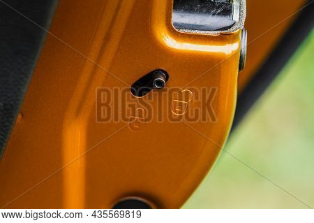 Door Lock For Child Protection. Closeup Of Car Door Locker System. Car Door Lock Knob. Child Safety 