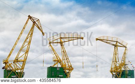 Port Cranes On Szczecin Lasztownia Island. Poland.