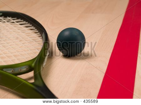 Raquete de squash