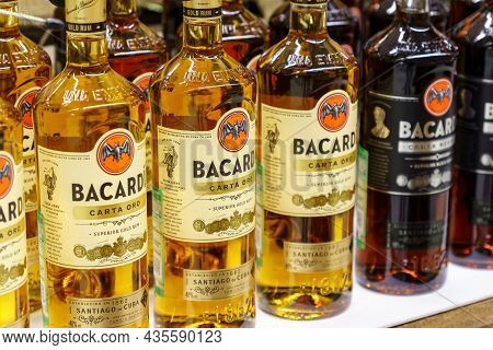 Volzhsky, Russia-september 21, 2021: Glass Bottle Bacardi Carta Oro Rum. On Supermarket Shelves