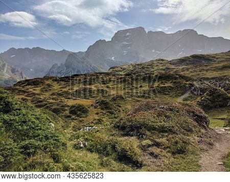 Alps Meadow In Switzerland. Alpine Pasture Near The Silberen Mountain In The Canton Of Uri. Hiking I