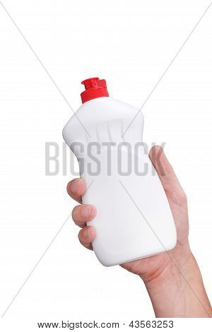 Hand with a detergent plastic bottle isolated on white background