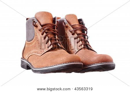 Pair Of New Hiking Boots On White Background