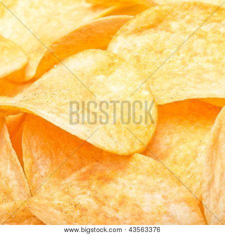 fried potato chips close up as background
** Note: Shallow depth of field
