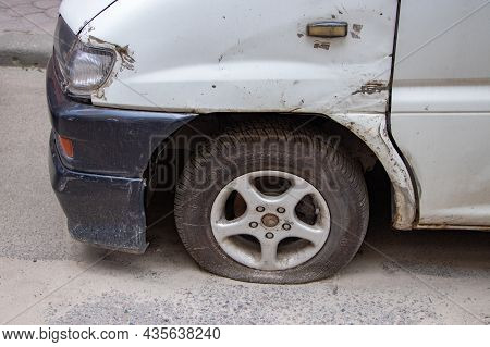 Lviv Ukraine. 01 August 2021: Car Wheel Flat Tire On The Road.