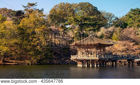 Ukimi-do Hall Above The Pond In Nara Park During Sakura Blossoms. Temple Japan