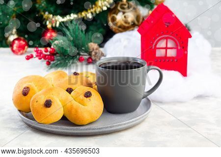 Swedish And Scandinavian Saffron Buns Lussekatter With Cup Of Coffee, Christmas Decoration
