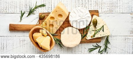 Set Or Assortment Cheeses. Suluguni With Spice, Camembert, Blue Cheese, Parmesan, Maasdam, Brie Chee