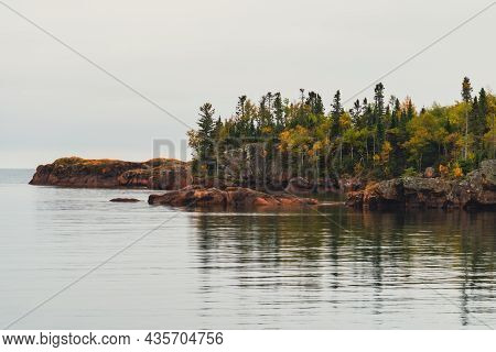 Rocky, Rugged Shoreline Of Lake Superior Near Grand Marais, Minnesota, During Autumn Fall Season