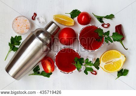 Tomato Juice With Salt And Parsley In Glass. Vampiro Cocktail With Ingredients. Bloody Mary Cocktail