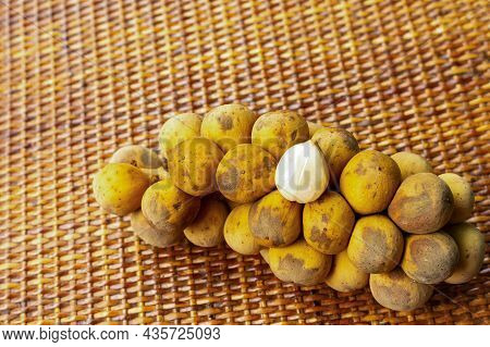 Longkong Branch Tropical Fruits Of Asia, Many Brown Fruits With A White Heart