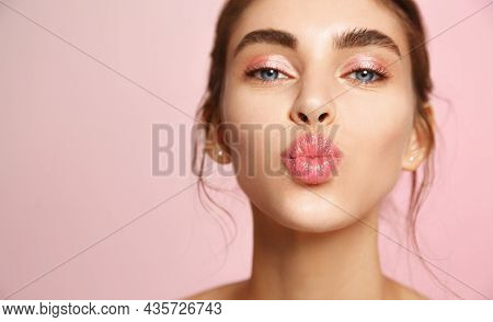 Cosmetics And Skin Care. Portrait Of Beautiful Woman Pucker Lips, Kissing, Showing Natural Clean Fac