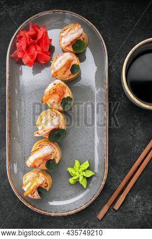 Sushi Rolls With Omelet, Shrimps And Crab Sticks