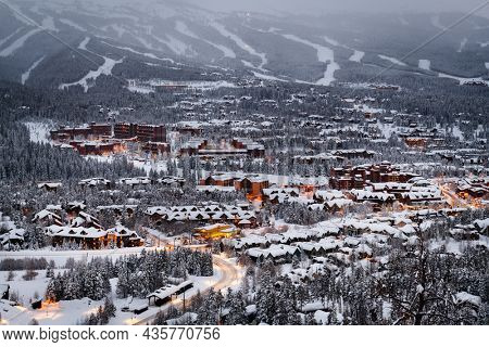 Breckenridge, Colorado, USA town skyline in winter at dusk.