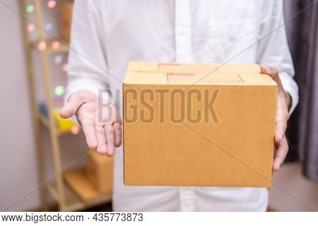 Asian Male Hand Writing Order Product List On Note For Online Customer In Warehouse Home Office Orde