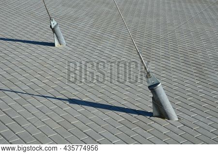 White Tarpaulin Taut, Shading From The Sun And Rain Over The Terrace Of The Restaurant, On The Playg