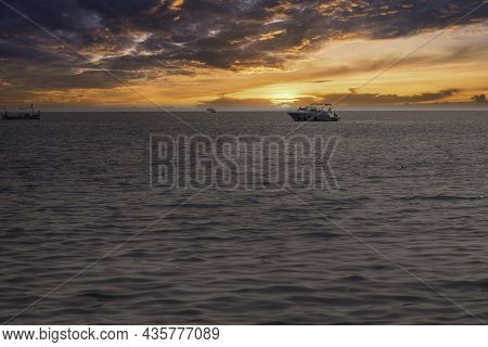Sailing Boats In The Sea At Dramatic Sunset